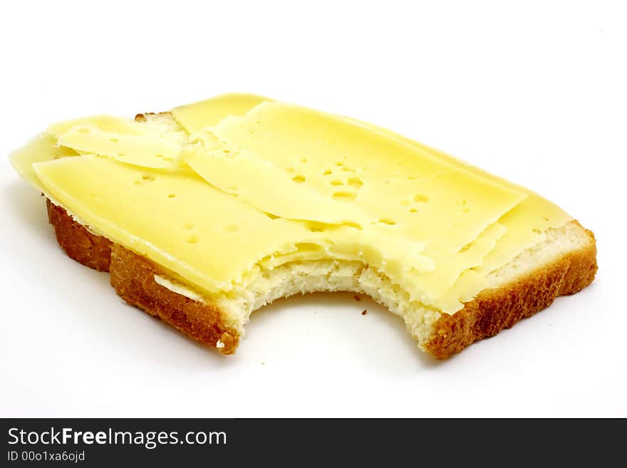 Slice of white bread with dutch cheese isolated on white