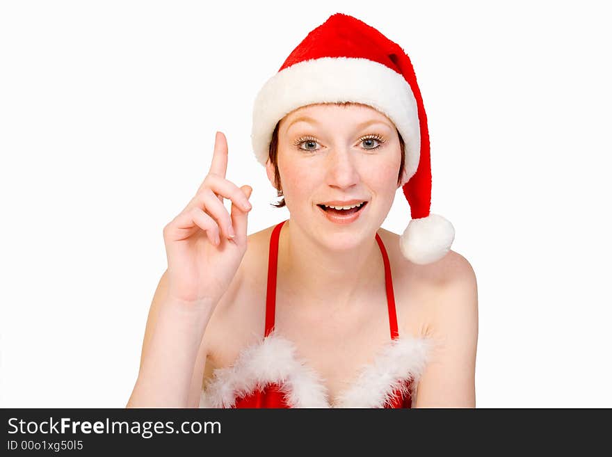 Beautifull girl in christmas bikini and with christmas hat puts her finger up in order to ask a question . With background clipping path for your convenience. Beautifull girl in christmas bikini and with christmas hat puts her finger up in order to ask a question . With background clipping path for your convenience