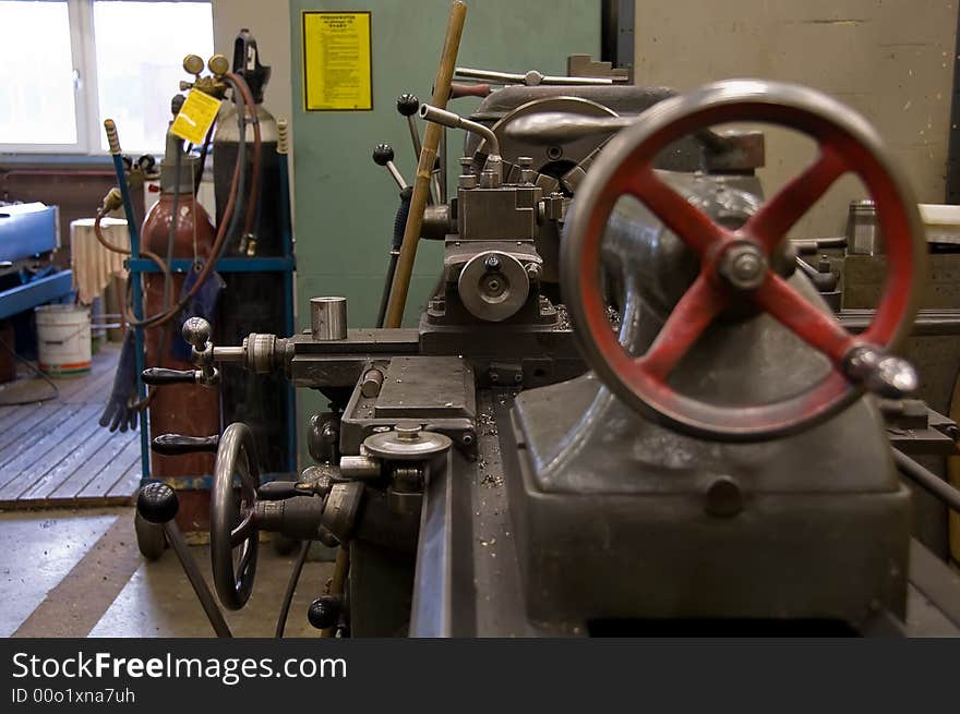 Turner at a workplace on an industry