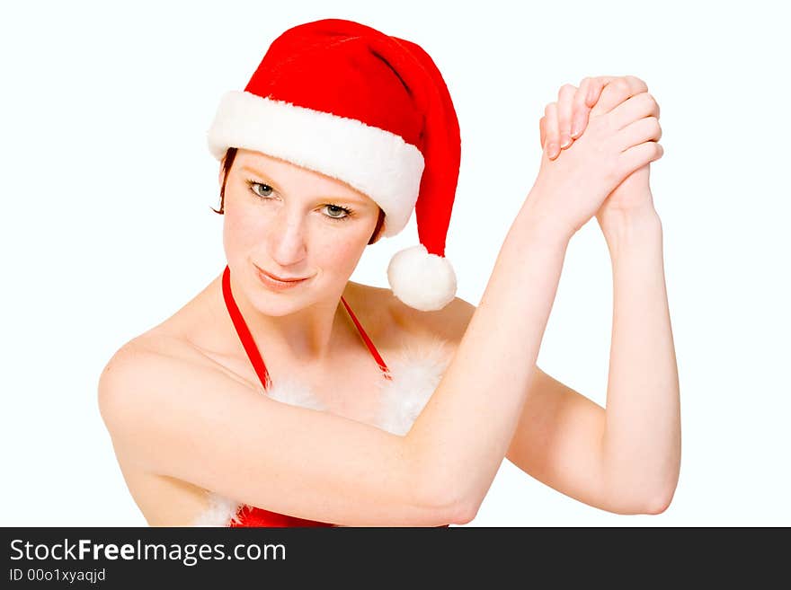 Beautifull girl in christmas bikini and christmas hat celebrating. With background clipping path for your convenience. Beautifull girl in christmas bikini and christmas hat celebrating. With background clipping path for your convenience