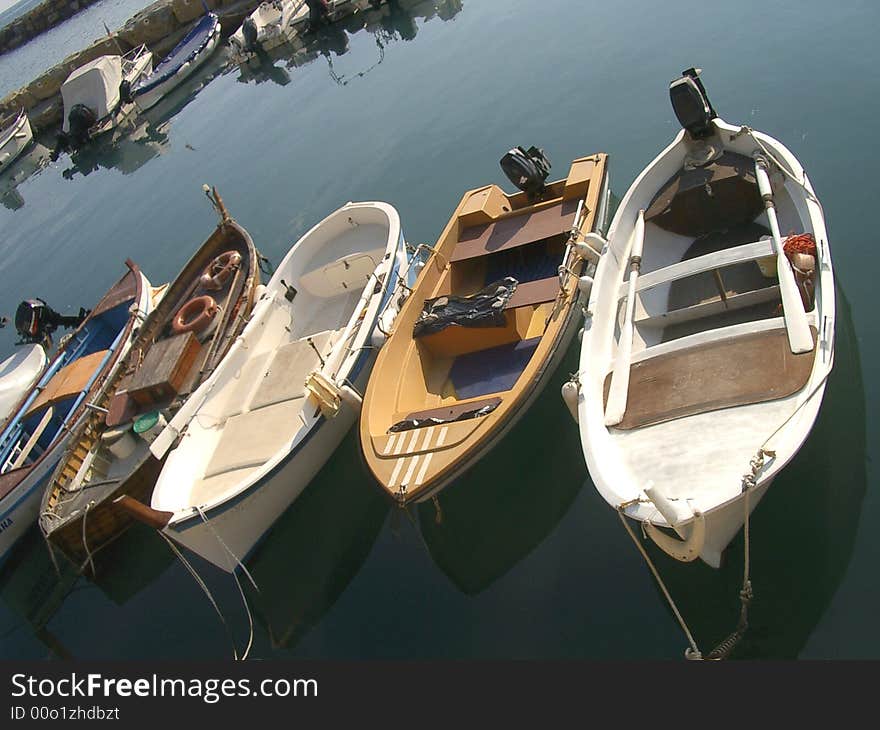 Boats inside a little harbour