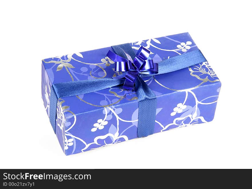 Blue gift box with ribbon isolated on white background