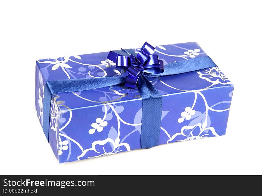 Blue gift box with ribbon isolated on white background