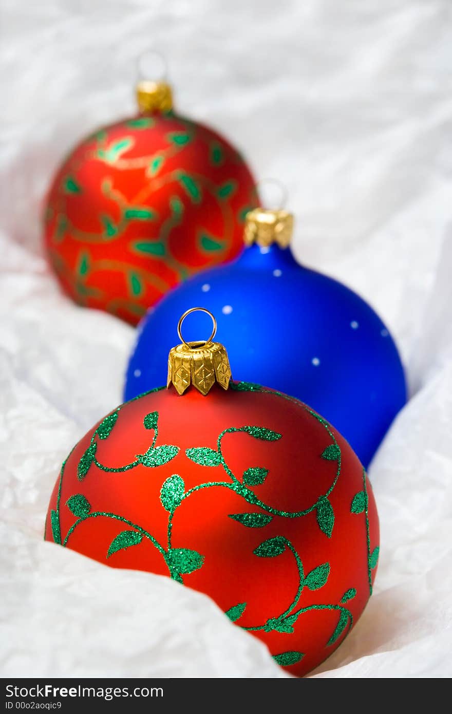 Christmas balls in wrapping paper, close-up