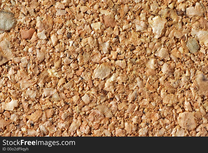 Cork tiles together for a brown cork textured background.