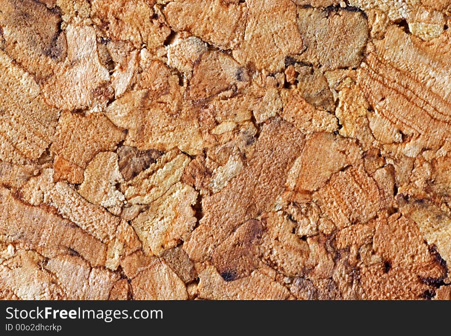 Cork tiles together for a brown cork textured background.