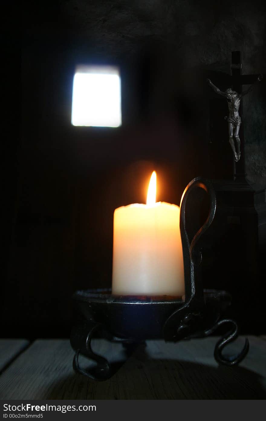 Candle with window and crucifixion. Candle with window and crucifixion