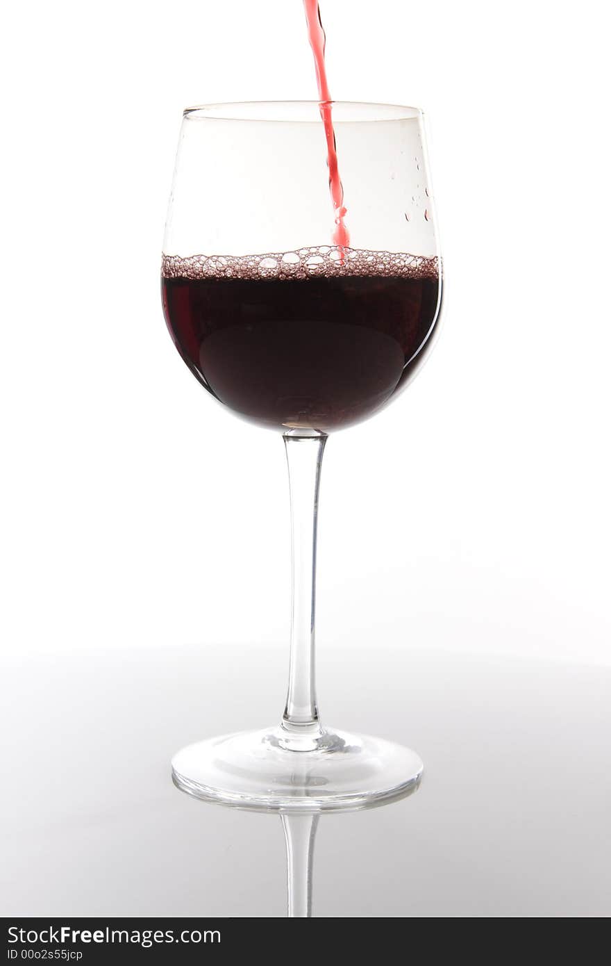 Red wine pouring down