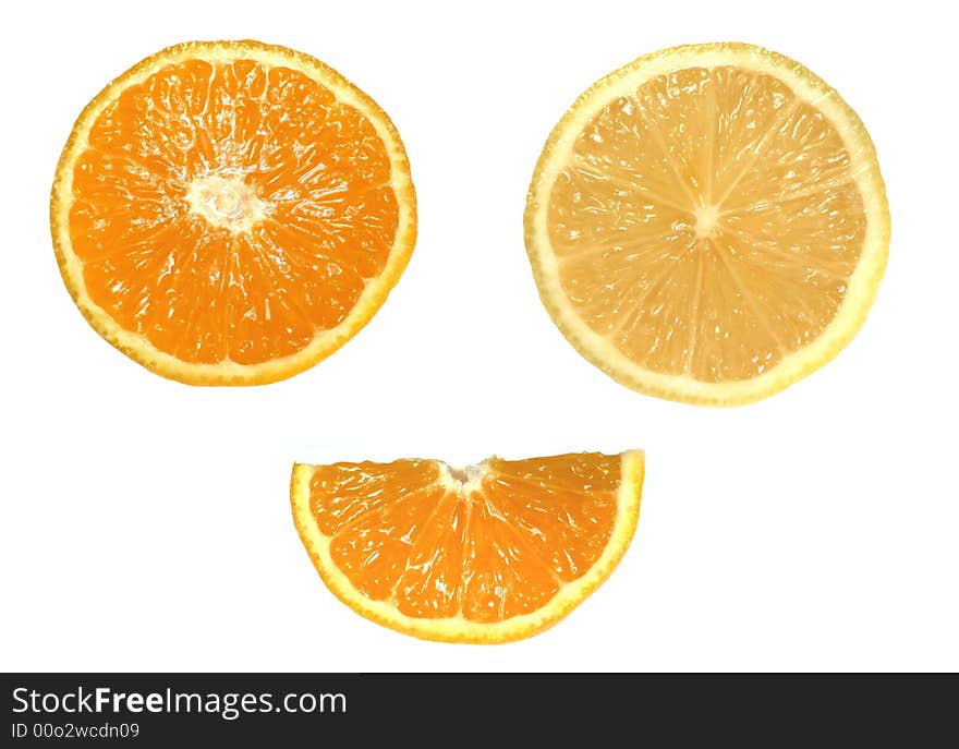 Orange and lemon slices isolated on a white background. Orange and lemon slices isolated on a white background