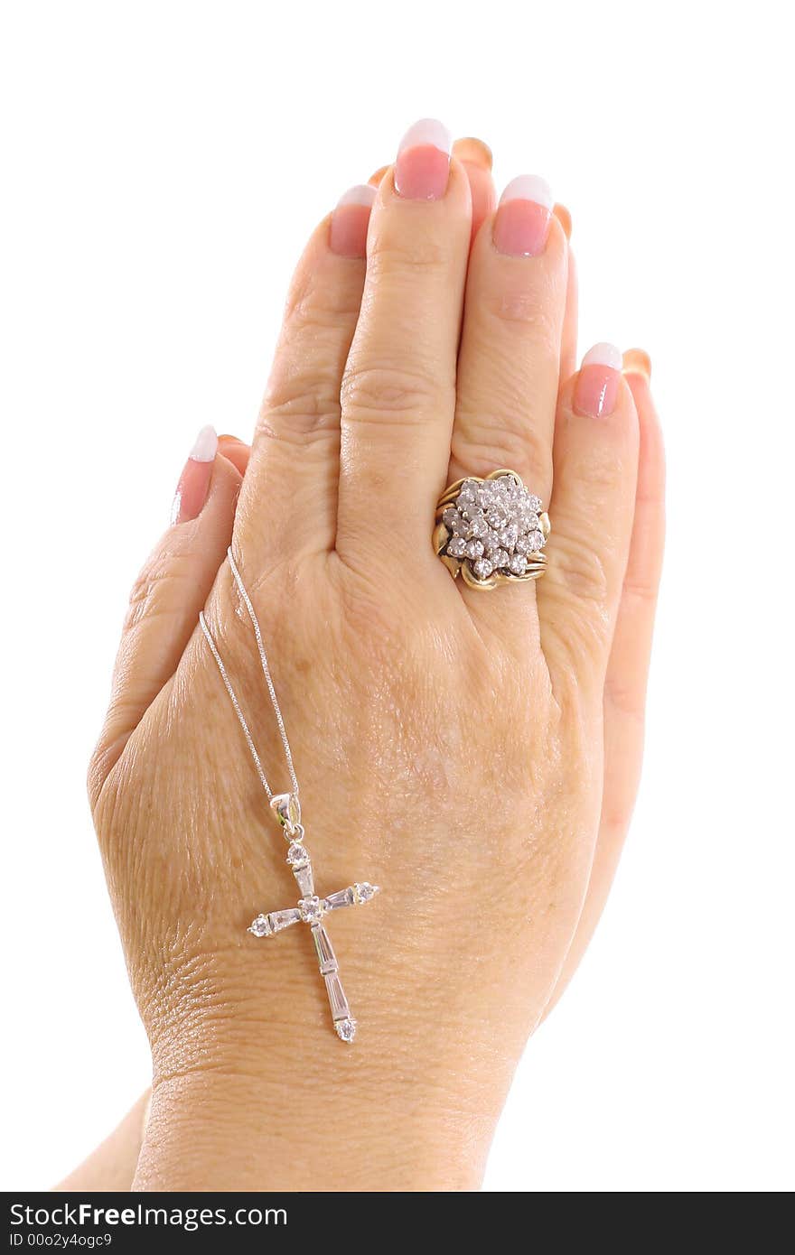 Praying hands with cross isolated on a white background