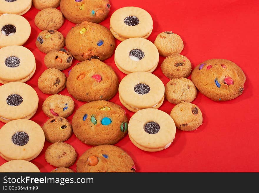 Chocolate chip cookies on a red background. Chocolate chip cookies on a red background