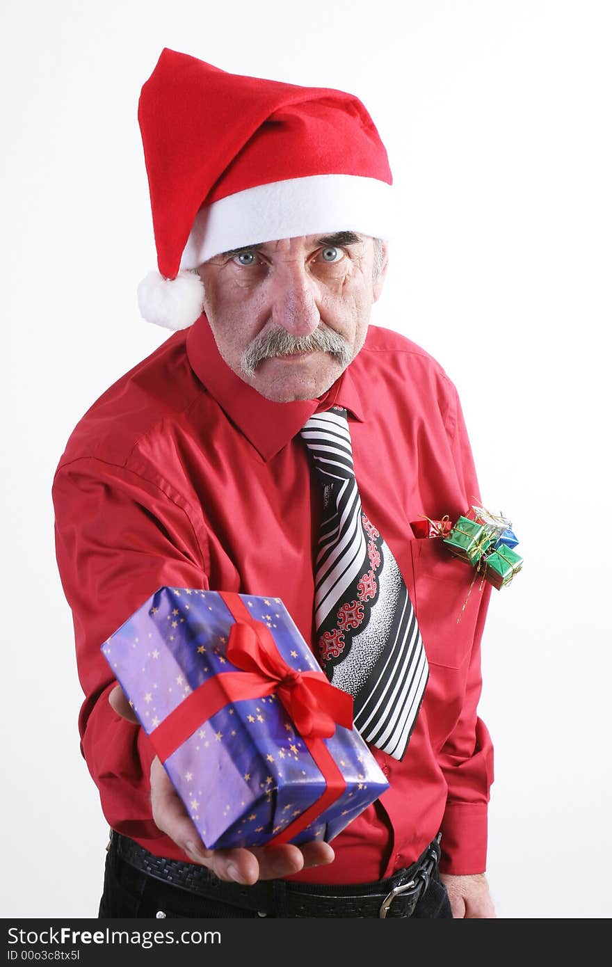 Businessman with Christmas gift and Santa Claus hat. Businessman with Christmas gift and Santa Claus hat.