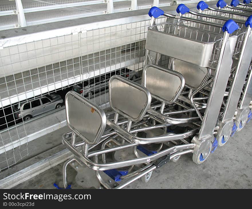 Rows of trolleys at the airport