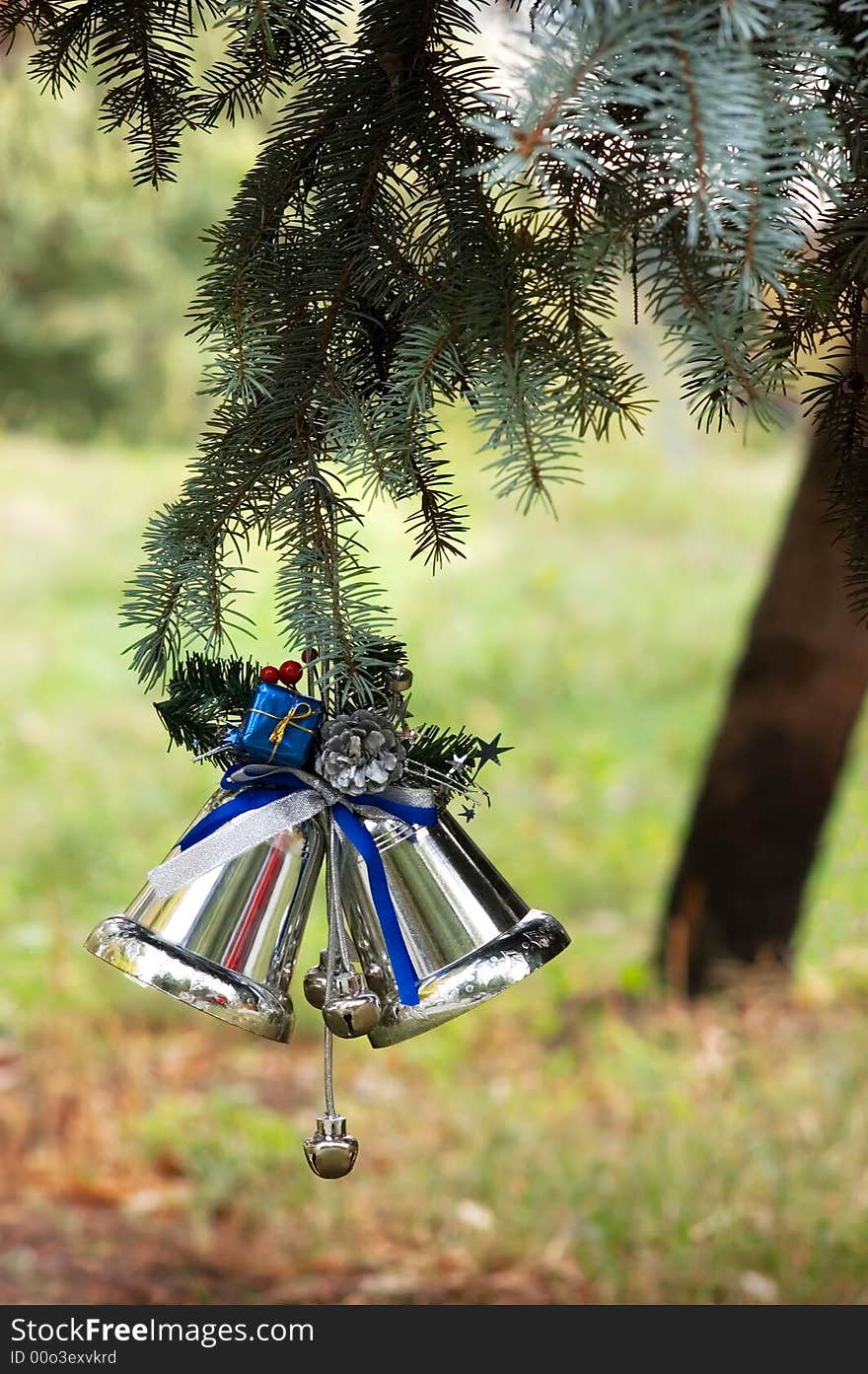 Outdoors Christmas tree decoration in global warming context (snow free)