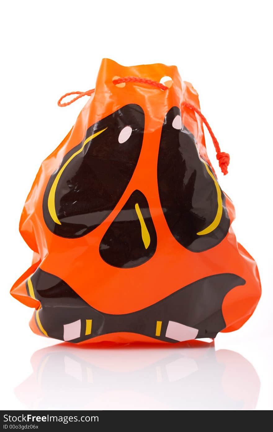 A trick or treat bag over a white background. A trick or treat bag over a white background