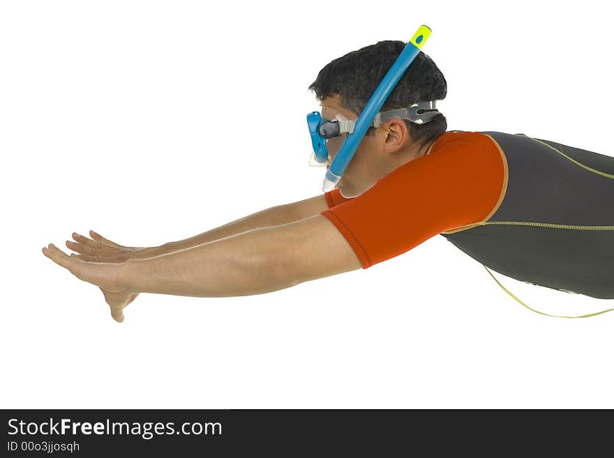 Young man diving with snorkel. White background, side view. Young man diving with snorkel. White background, side view.