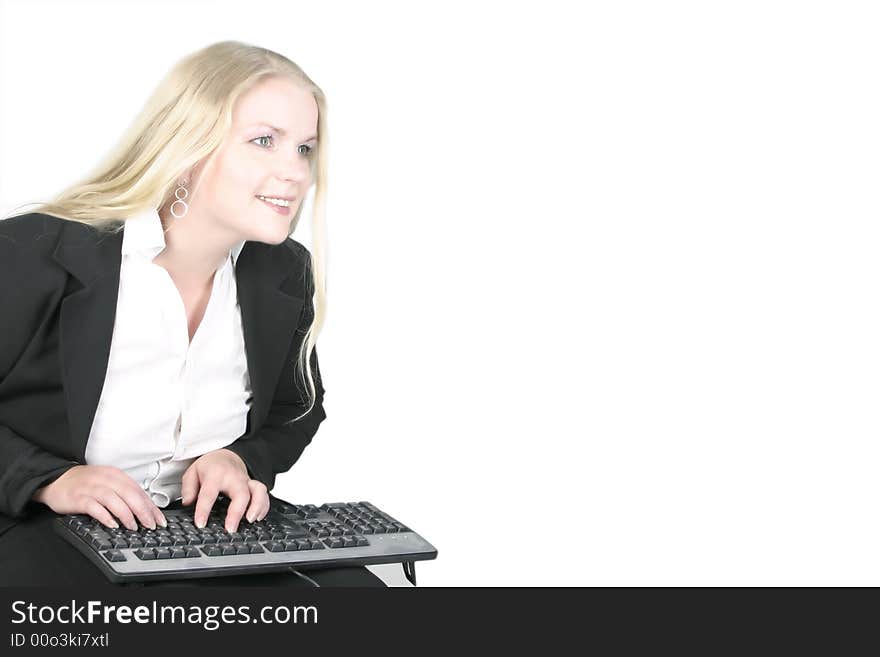 Blonde woman with a keyboard on her knees. Blonde woman with a keyboard on her knees