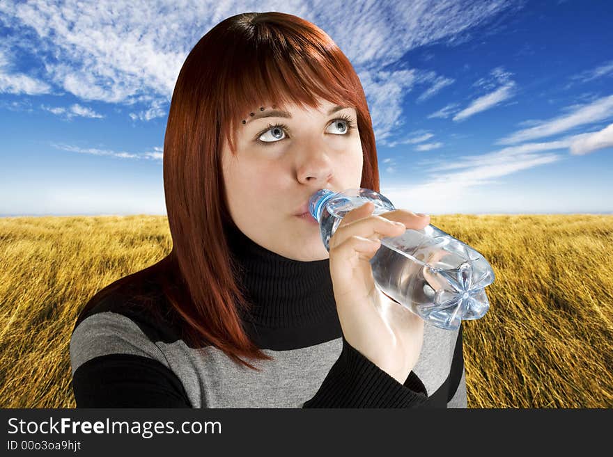 Redhead Girl Drinking Water