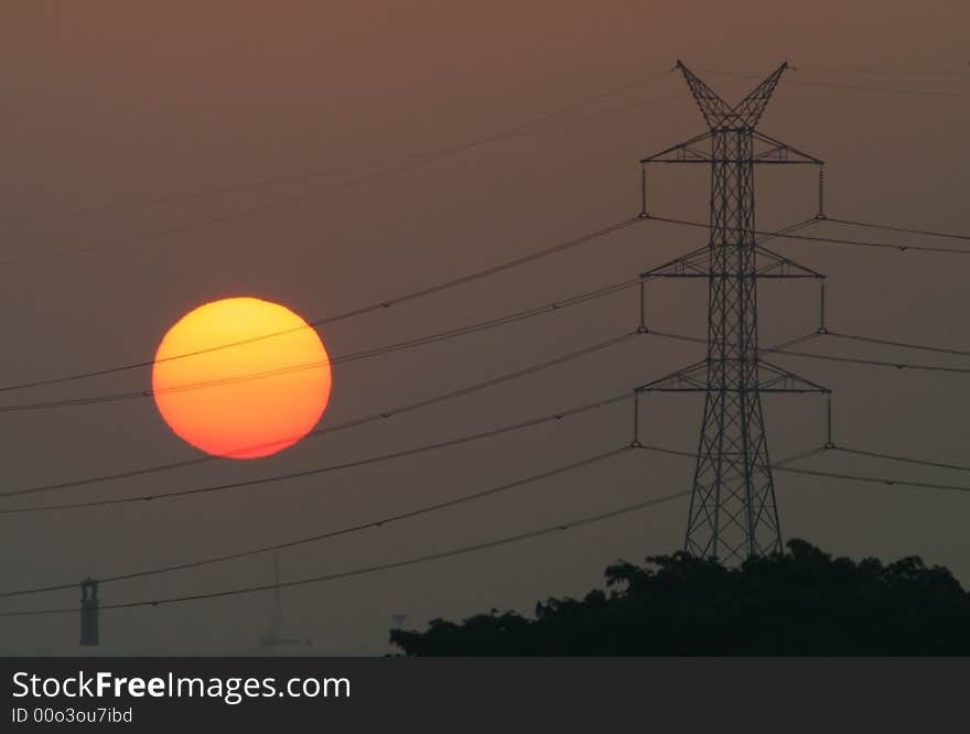 Hazy industrial sunrise