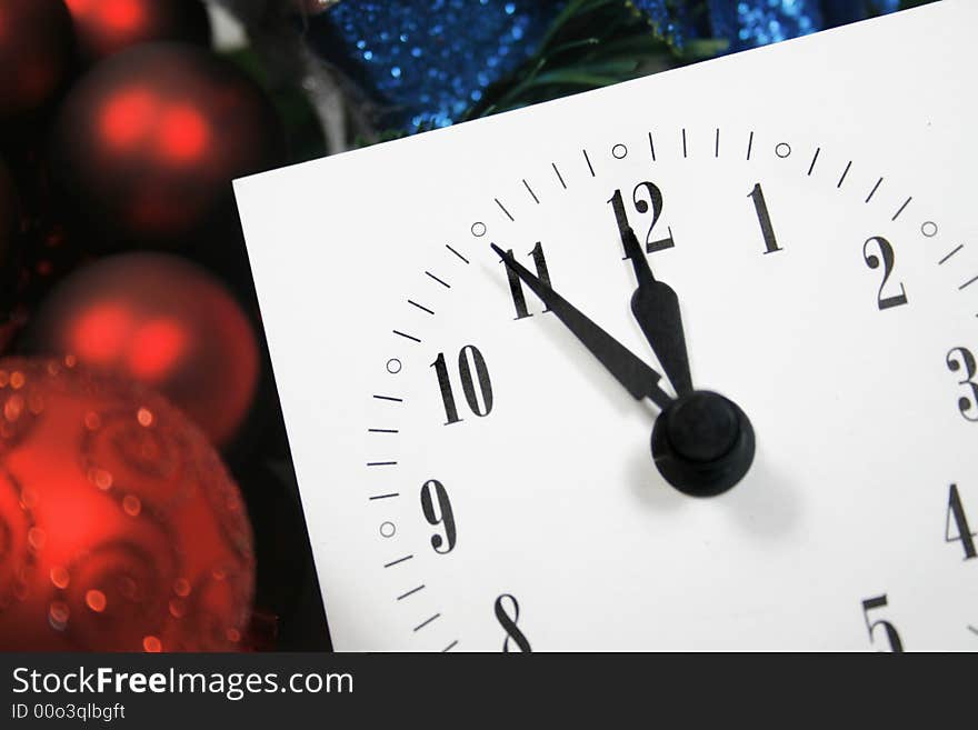 View of a clock, counting down to midnight on a New Year's night