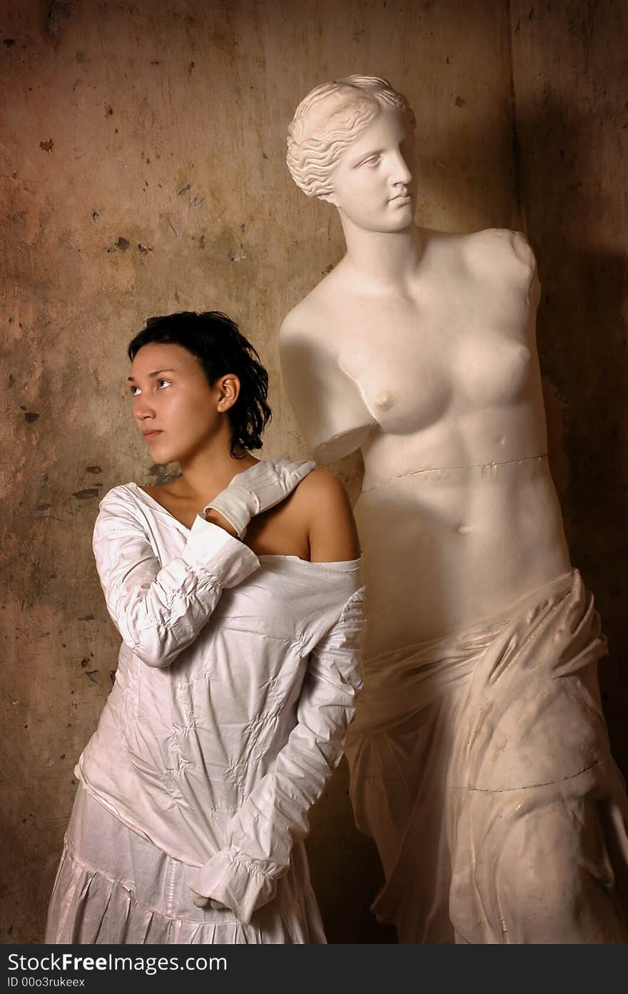 the girl with an antique statue