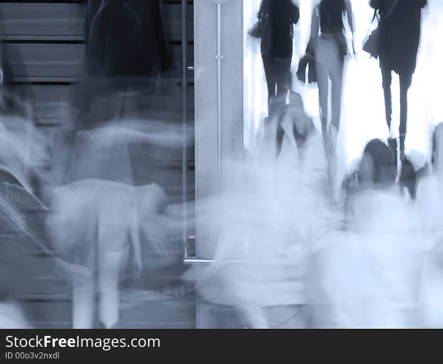 Group of people climbing stairs. Taken with slow shutter speed. Group of people climbing stairs. Taken with slow shutter speed.