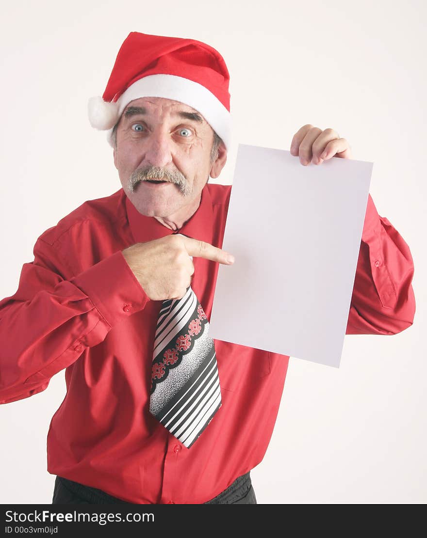 Businessman with blank sign and Santa Claus hat. Businessman with blank sign and Santa Claus hat.