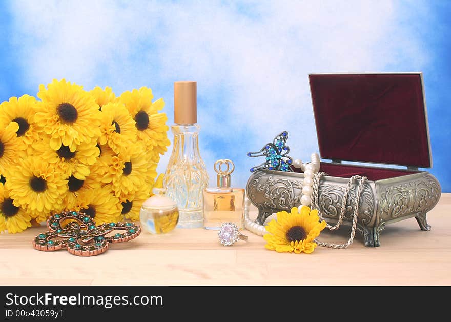 Jewelry and Perfume with Flowers