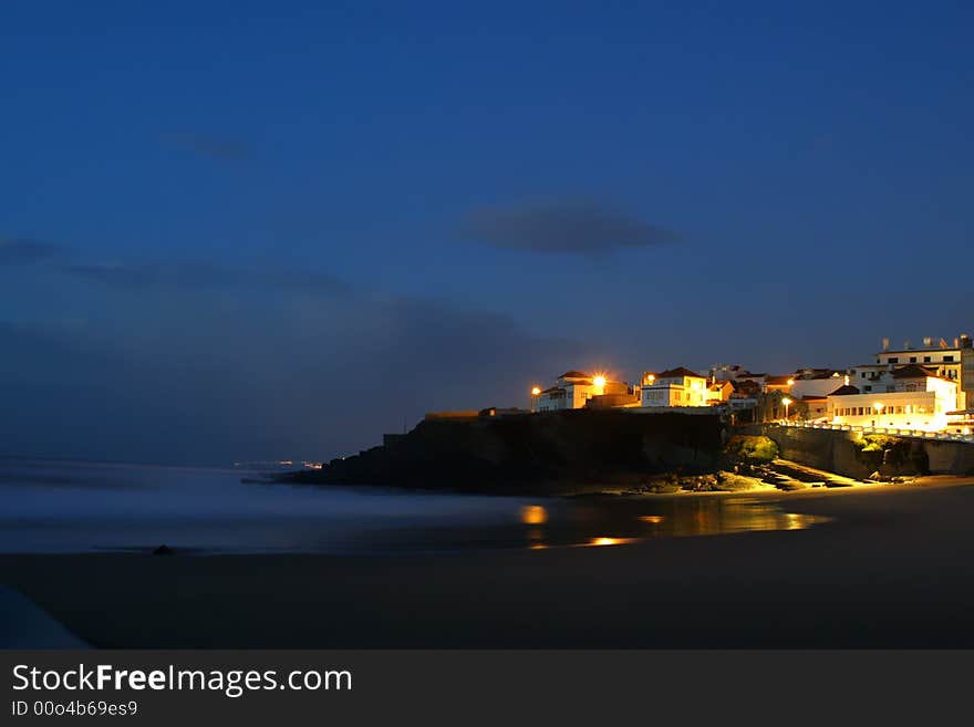 Citylandscape by night in beach, portugal coast (long exposure)