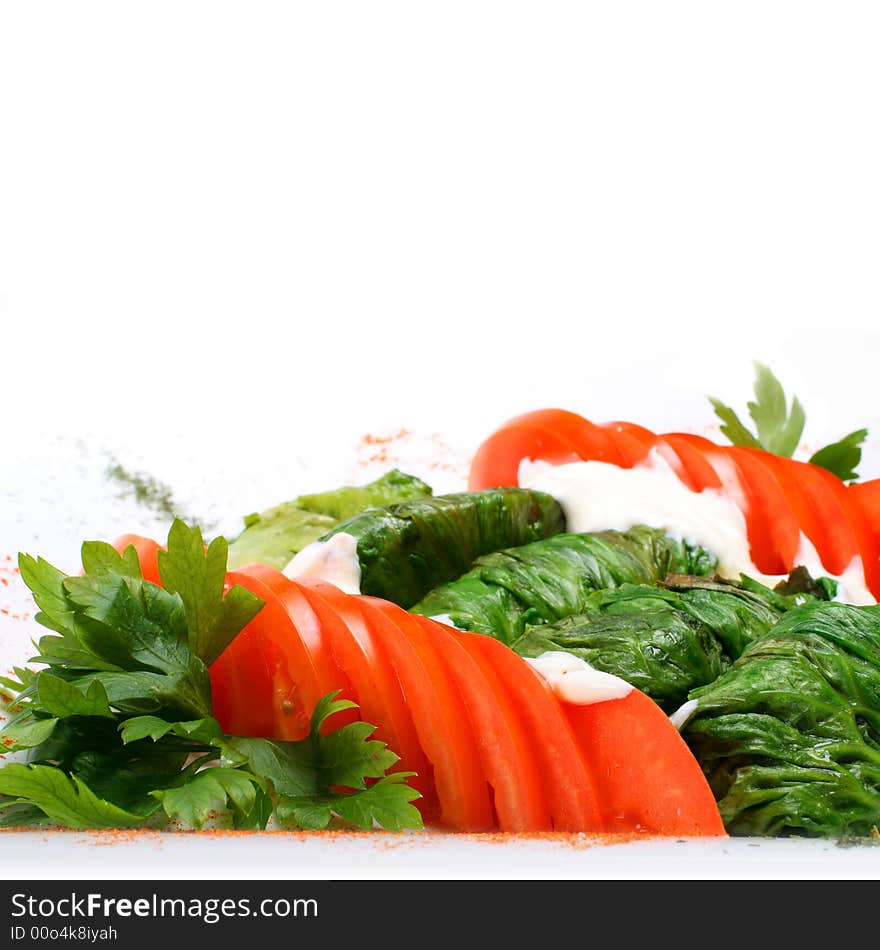 Gourmet vegetarian dish on white background. Gourmet vegetarian dish on white background