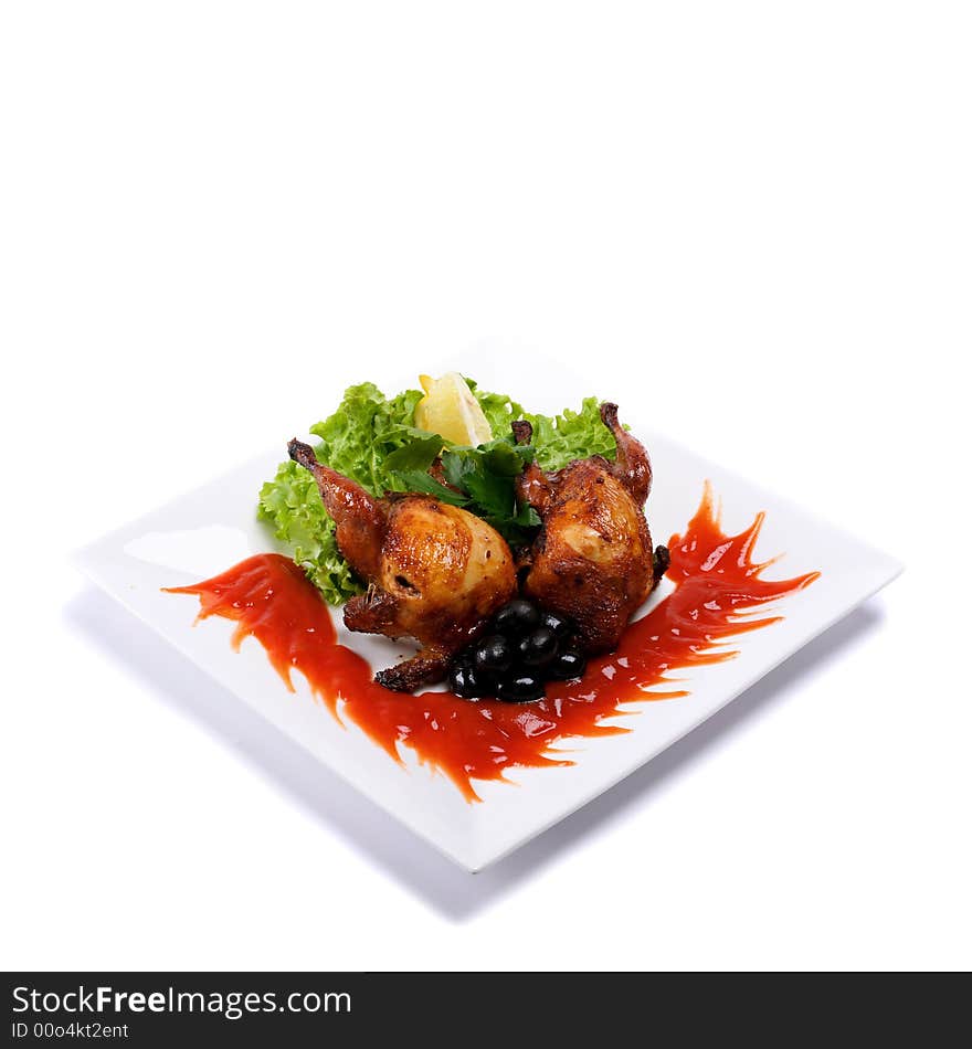 Gourmet grilled chicken on white plate