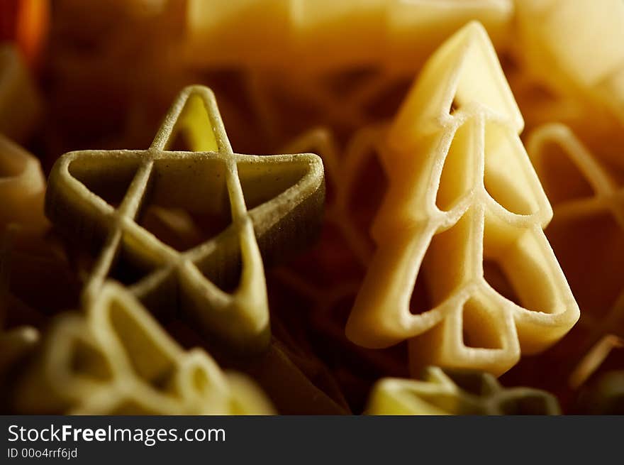 Colourfull christmas decorations- stars and trees made from pasta. Colourfull christmas decorations- stars and trees made from pasta.