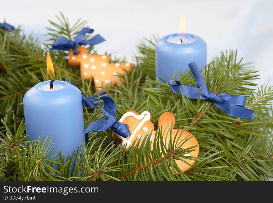 Christmas- blue candles, pine, gingerbread cookies. Christmas- blue candles, pine, gingerbread cookies