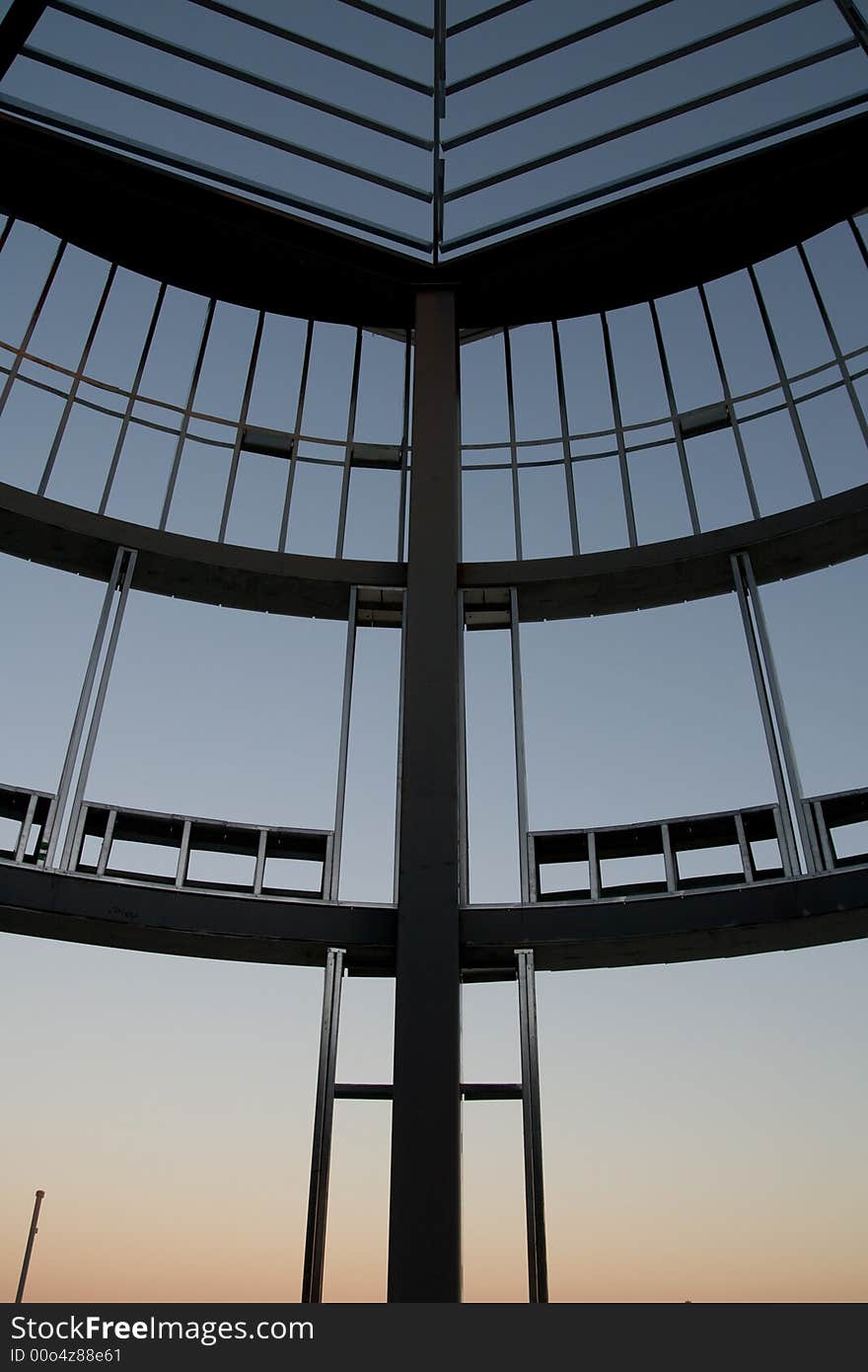 Turret under construction showing silhouetted exposed framework. Turret under construction showing silhouetted exposed framework