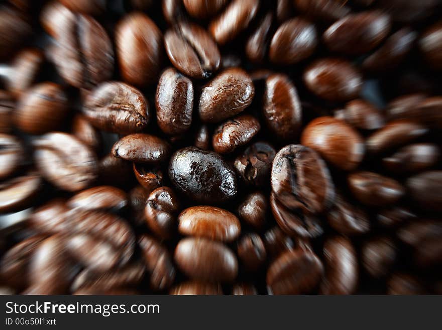 Macro closeup of coffee beans with zoom effect. Macro closeup of coffee beans with zoom effect