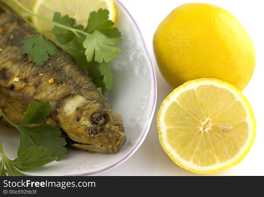 Roasted fish with lemon and parsley