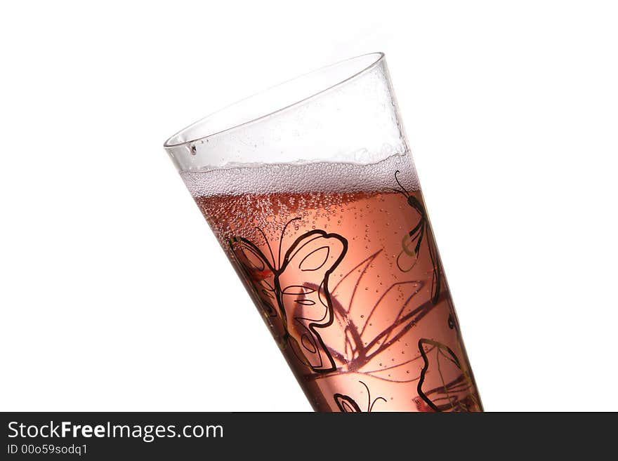 A champagne flute with red champagne with bubbles. Isolated on white space (for text).