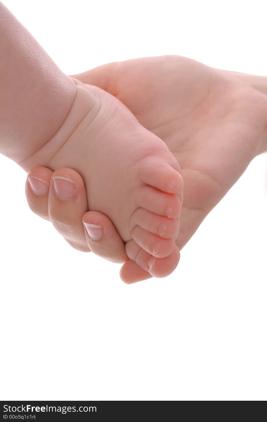 Mother holding babys foot upclose isolated on a white background