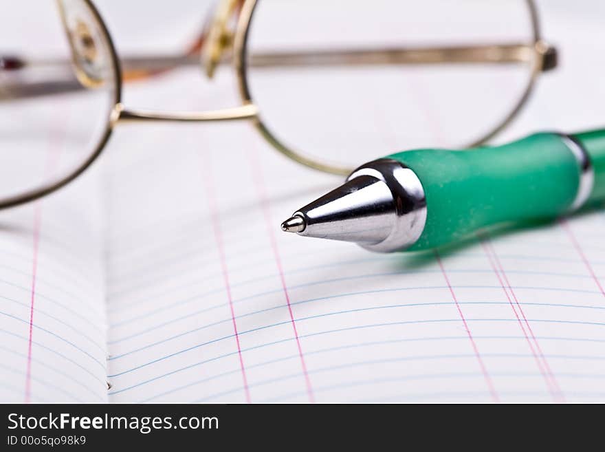 Glasses and pen.