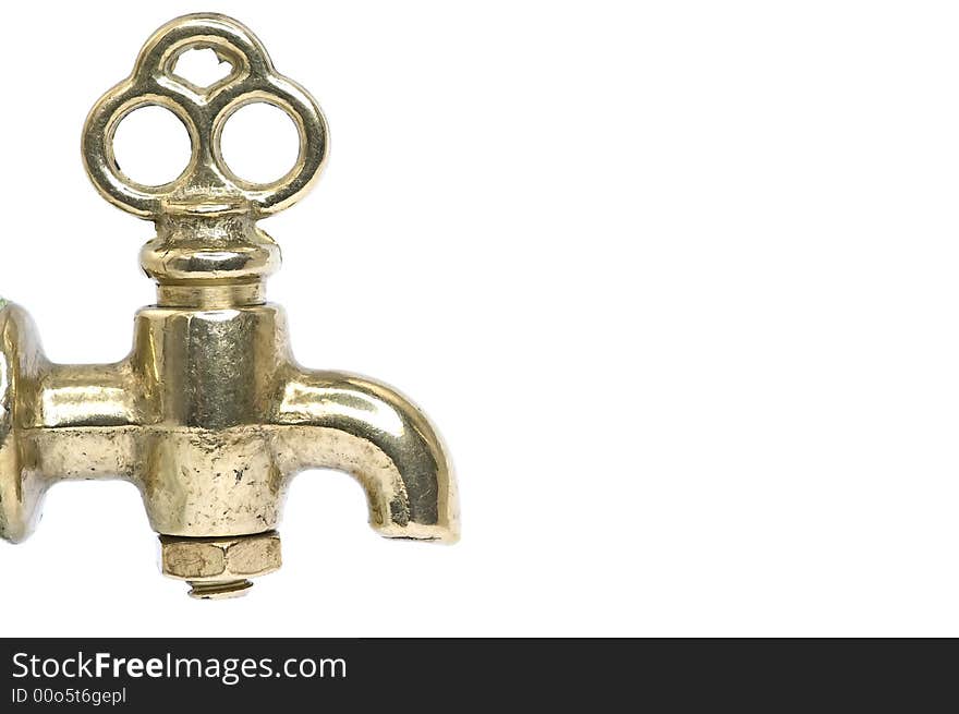 Brass faucet isolated on white background