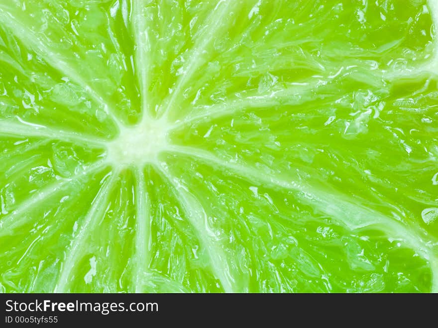 Macro of a fresh lime fruit for backgrounds. Macro of a fresh lime fruit for backgrounds