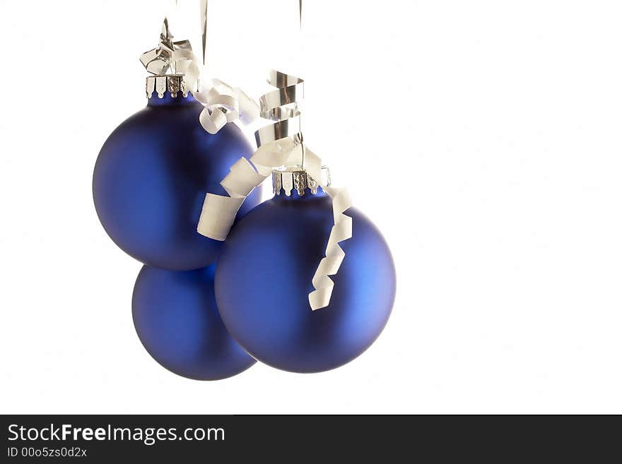 Three shiny blue Christmas balls isolated on white background. Three shiny blue Christmas balls isolated on white background