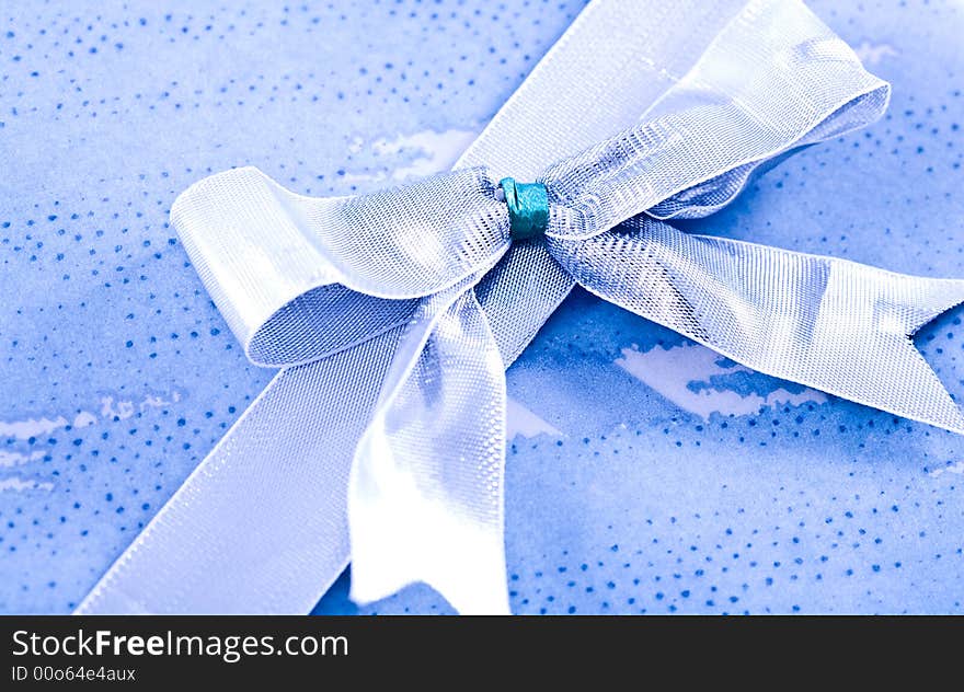 Ribbon On The Blue Background.