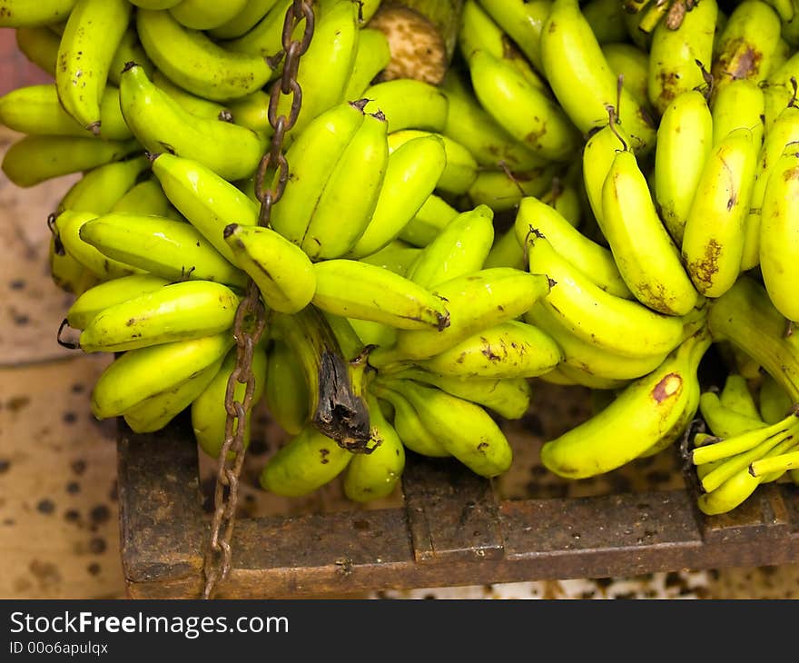 Fresh bananas being weighed out at delivery to retail outlet. Fresh bananas being weighed out at delivery to retail outlet