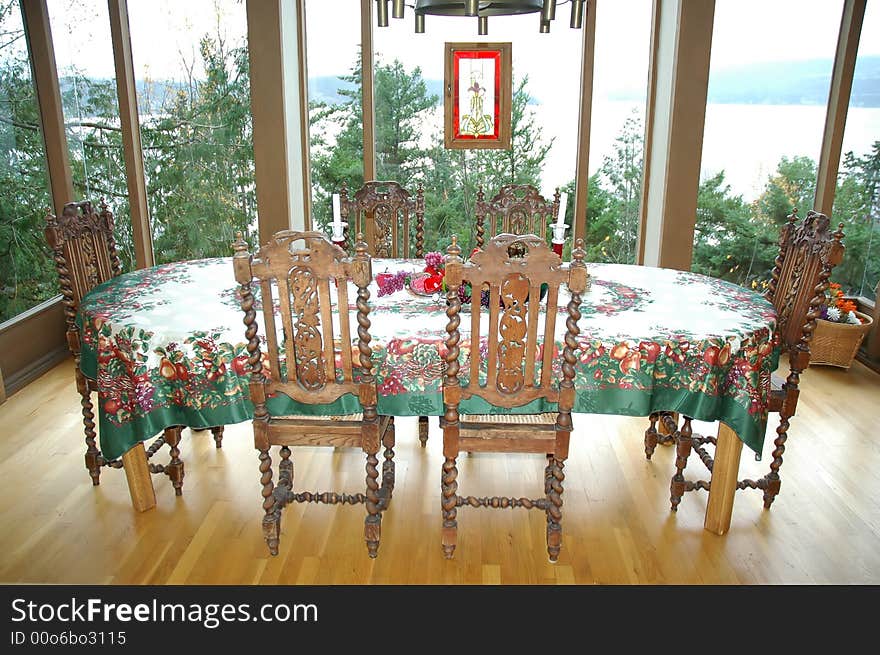 Dinner table decorated for the christmas season. Dinner table decorated for the christmas season.