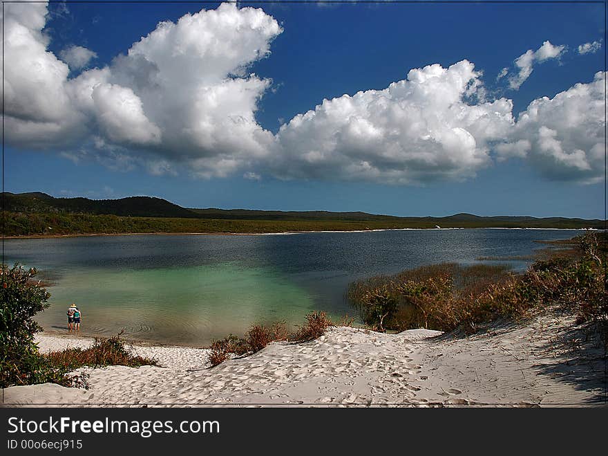 Romantic couple on the Blue lagoon, Moreton island in australia.