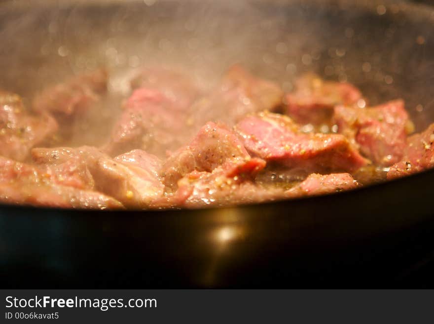 Beef Tenderloin Pieces Grilling In A Frying Pan