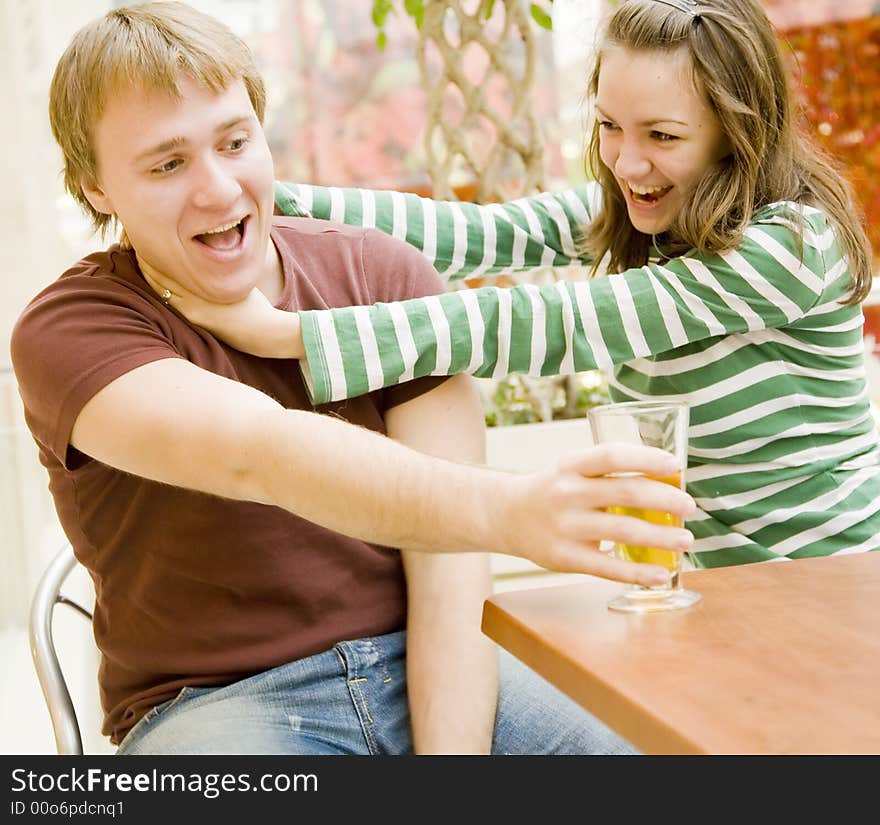 Happy pair in a cafe