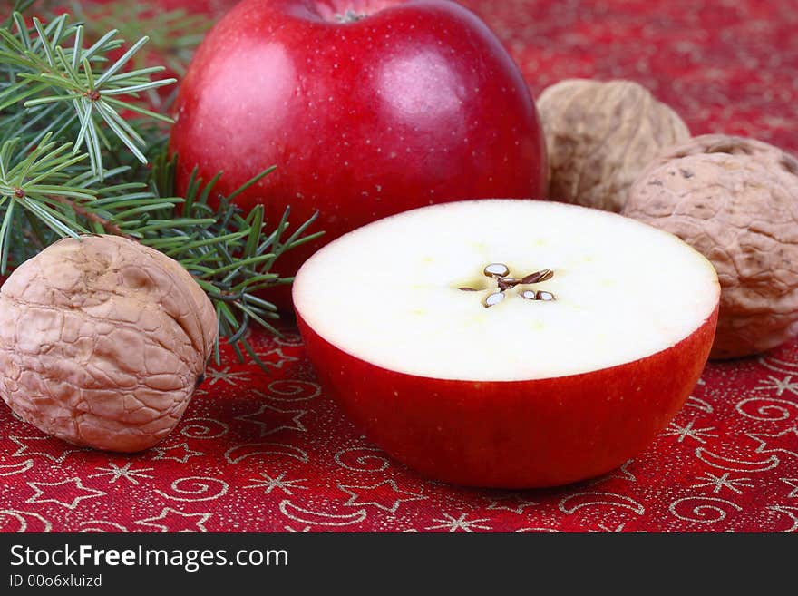 Christmas - red apples, walnuts and pine. Christmas - red apples, walnuts and pine