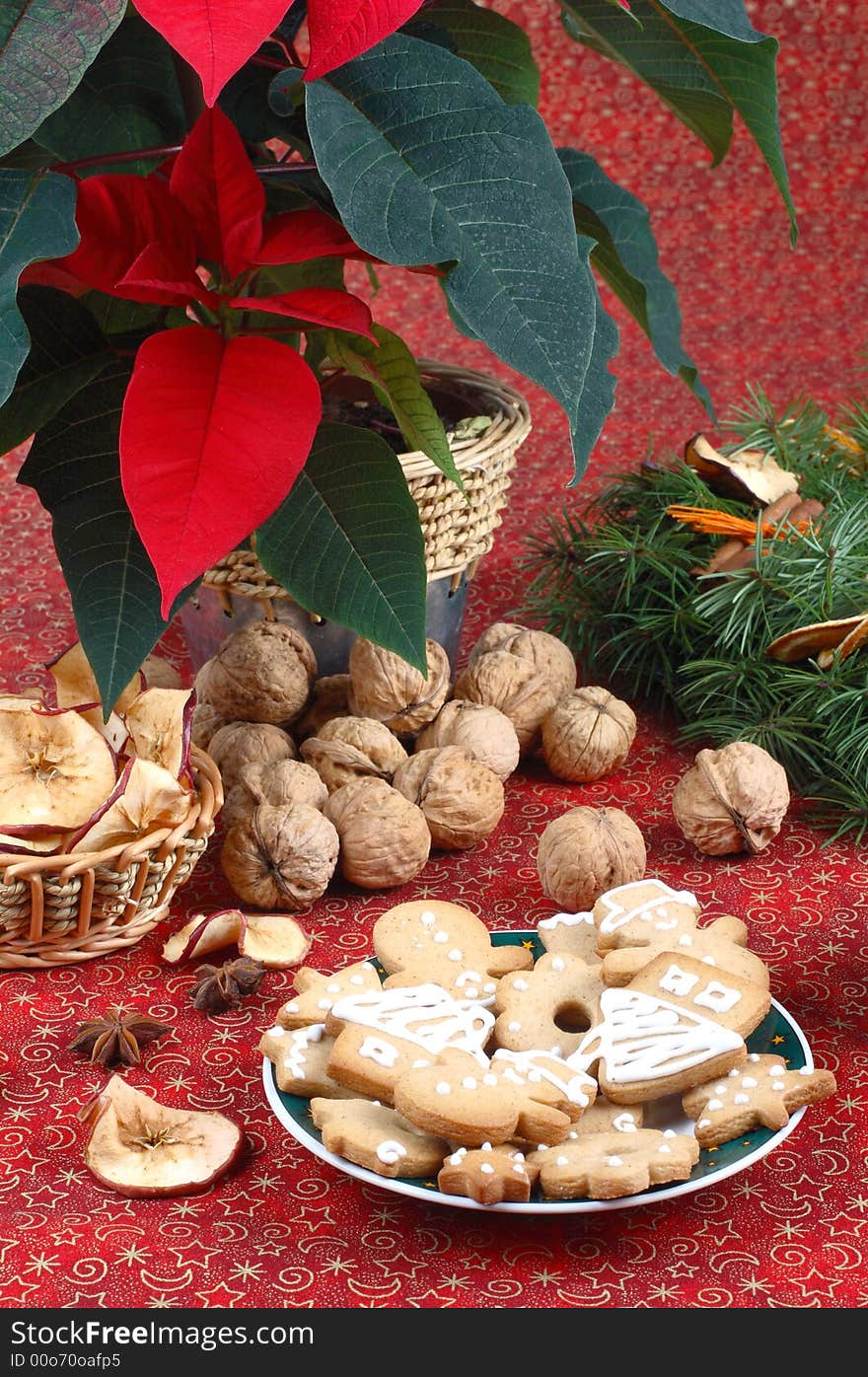 Advent wreath, gingerbread cookies, walnuts, dried apples. Advent wreath, gingerbread cookies, walnuts, dried apples